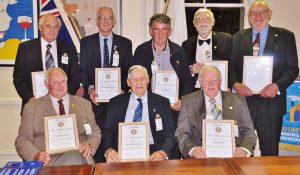 Eight members of the Rotary Club of Victor Harbor who have each given over 25 years service to the club.