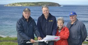 Rotary project team looking over the plans